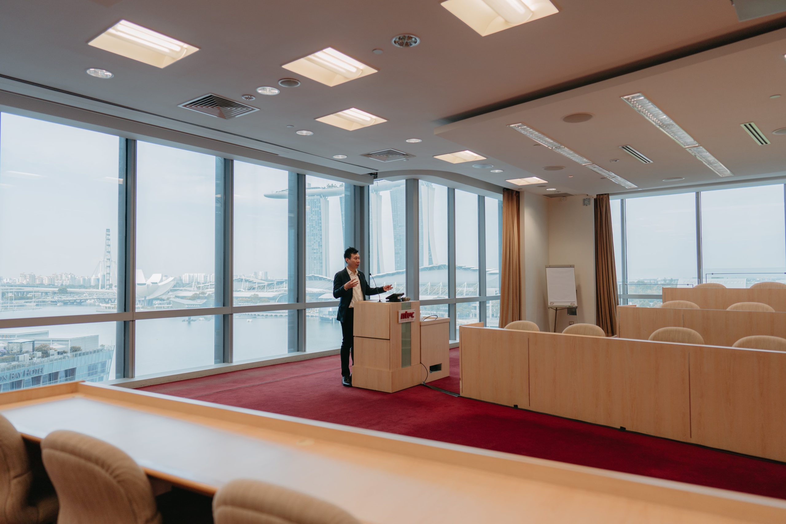 Seminar Room - Workshop with Singapore Marina Bay skyline - sideview