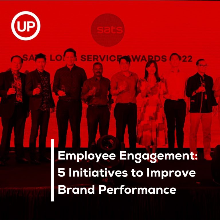 Employee engagement: SATS long service award stage prize giving with a red filter above photograph